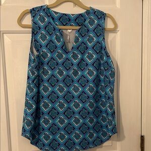 Lulu-B  UPF built into the fabric. Blue and Black Geometric Blouse